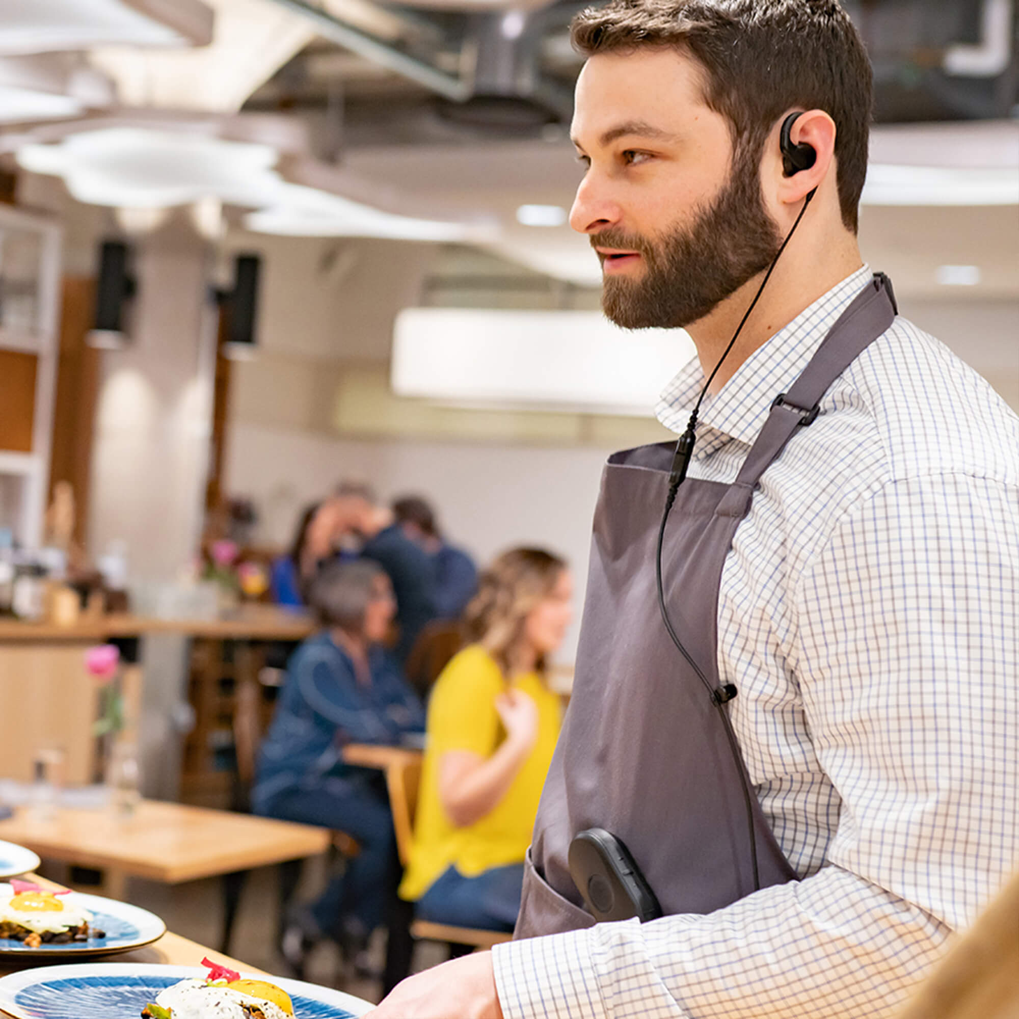 Motorola Solutions CLP1010e compact wearable two-way radio with push-to-talk functionality, lightweight design, and reliable hands-free communication for retail, hospitality, restaurants, and business operations