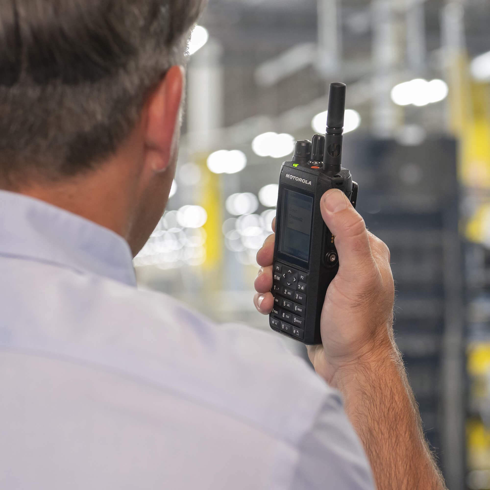 Motorola Solutions MOTOTRBO R7 portable digital two-way radio with advanced noise cancellation, clear audio, rugged waterproof design, and reliable push-to-talk communication for manufacturing, construction, security, and industrial operations