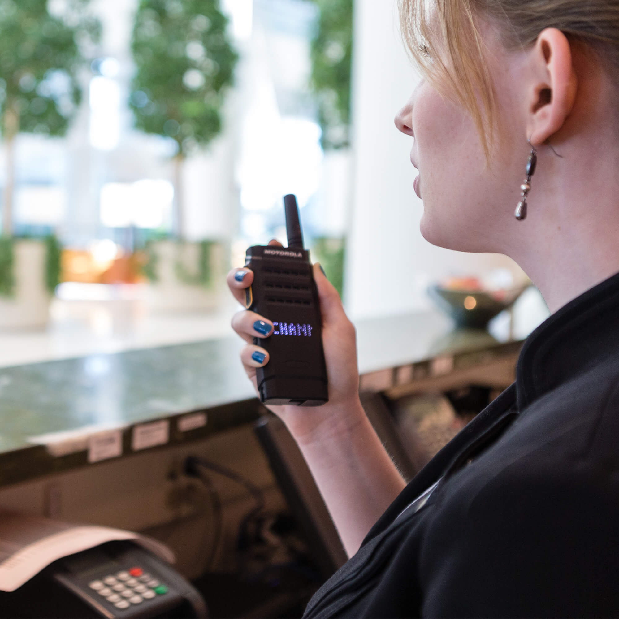 Motorola Solutions MOTOTRBO SL300 slim portable digital two-way radio with push-to-talk functionality, lightweight design, and reliable team communication for retail, hospitality, security, education, and business operations