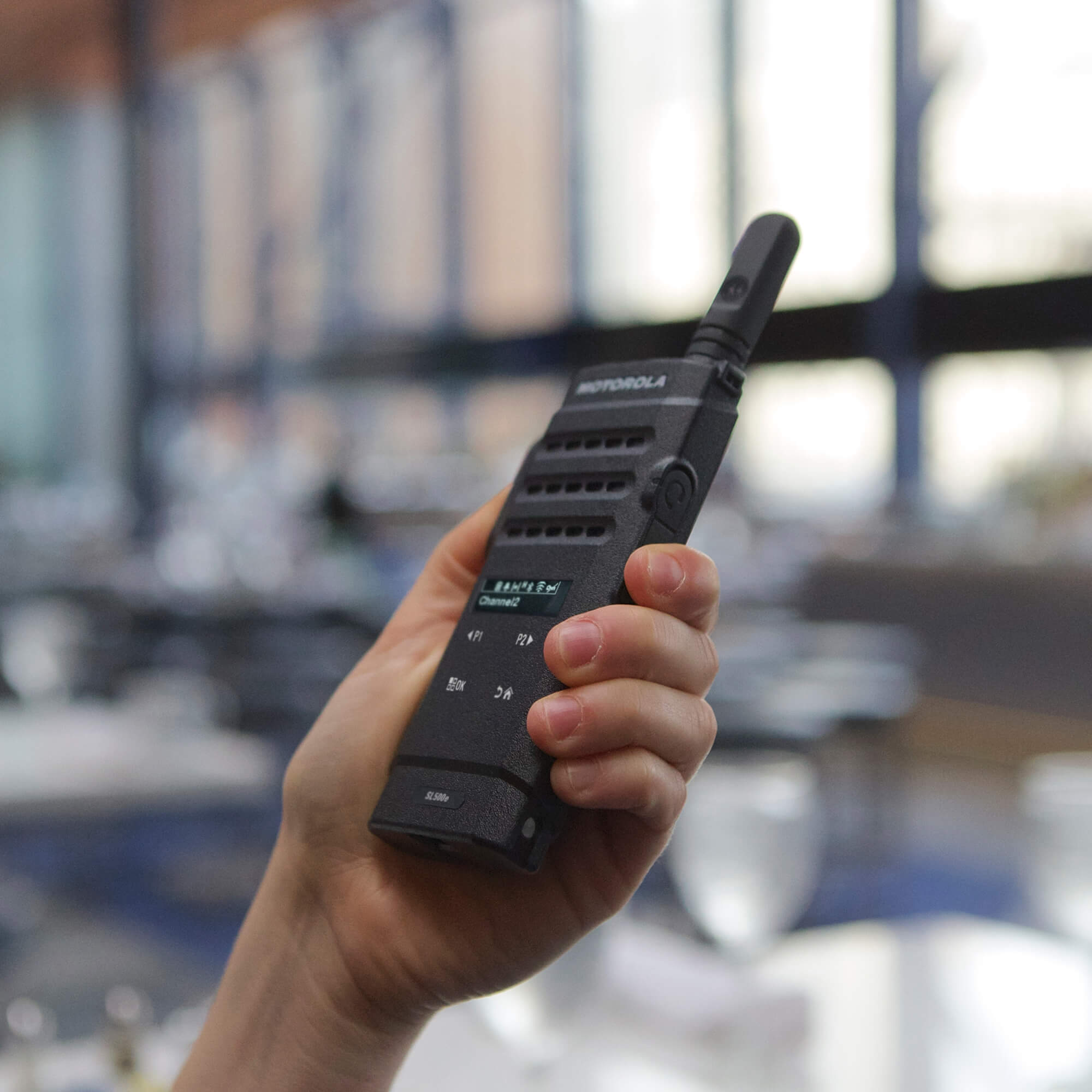 Motorola Solutions MOTOTRBO SL3500e slim portable digital two-way radio with push-to-talk functionality, discreet virtual keypad, lightweight design, and reliable team communication for hospitality, retail, security, education, and business operations